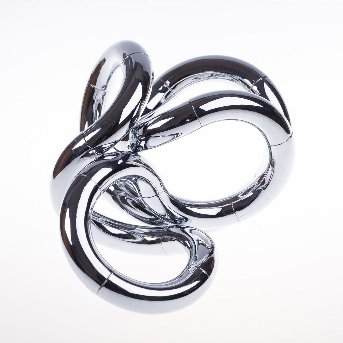 Tangle Original Chrome – rörlig skrivbordsskulptur i krom